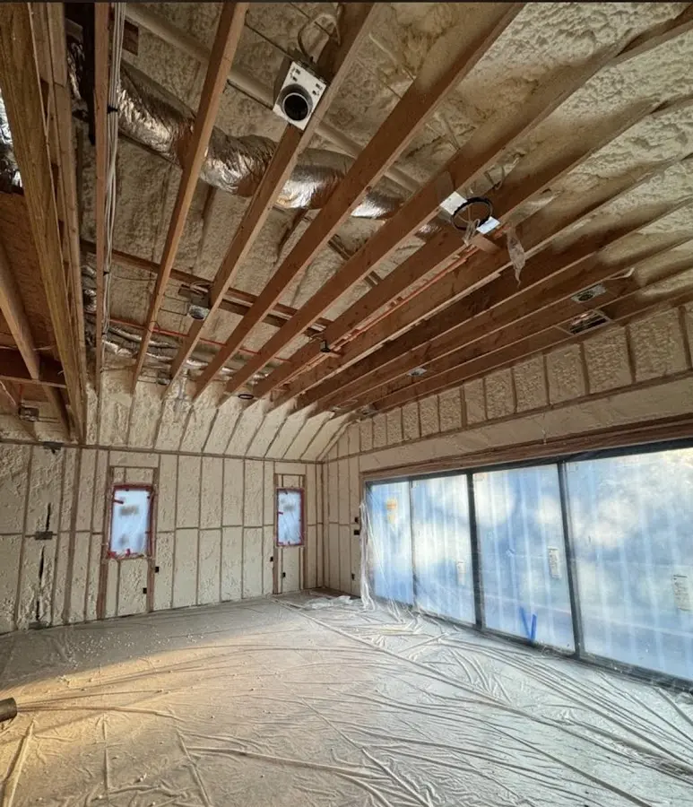 Interior walls and ceiling insulated with spray foam during new construction in Vienna